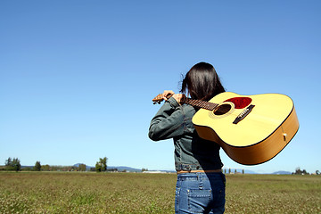 Image showing Woman guitar player