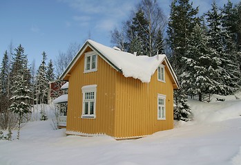 Image showing Yellow house in snow