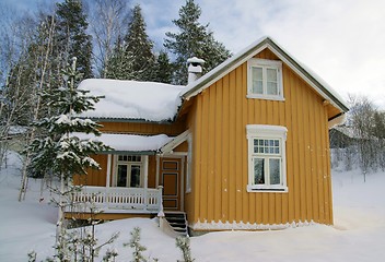 Image showing Yellow house in snow