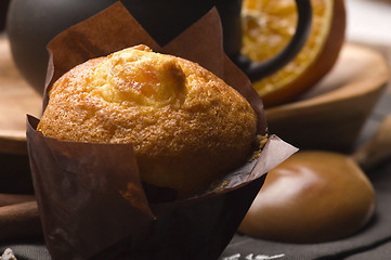 Image showing Homemade cinnamon muffins with coffe