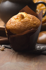 Image showing Homemade cinnamon muffins with coffe