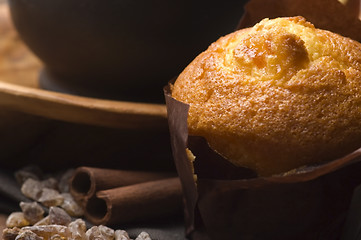 Image showing Homemade cinnamon muffins with coffe