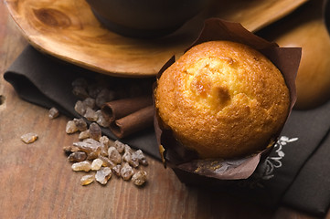 Image showing Homemade cinnamon muffins with coffe