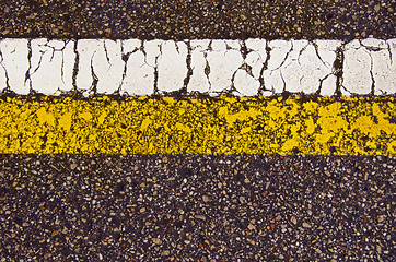 Image showing Asphalt road mark macro backdrop white yellow line 