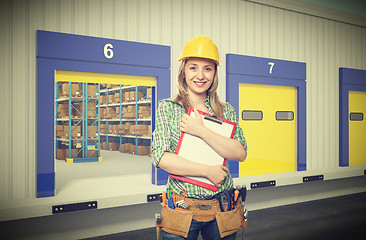 Image showing smiling woman on duty