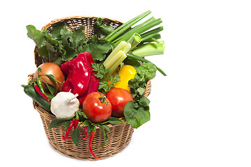 Image showing Fresh vegetables in basket isolated on white