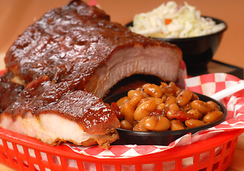 Image showing BBQ Ribs with beans and cole slaw