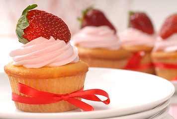 Image showing Delicious Vanilla cupcake with strawberry frosting