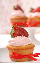 Image showing Delicious Vanilla cupcake with strawberry frosting