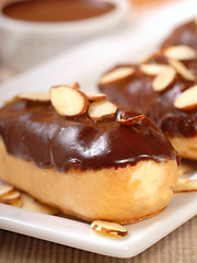 Image showing Delicious chocolate eclairs with almonds