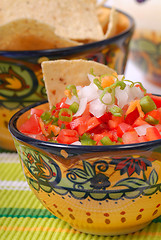 Image showing Spicy salsa with tortilla chips