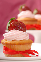 Image showing Delicious Vanilla cupcake with strawberry frosting