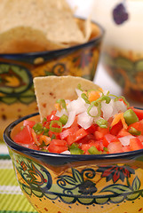 Image showing Spicy salsa with tortilla chips
