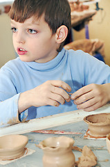 Image showing shaping clay kid