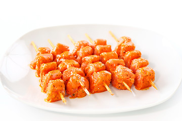 Image showing Raw skewered marinated chicken 