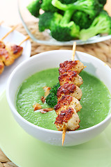 Image showing Broccoli soup with skewered chicken