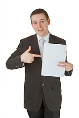 Image showing Young businessman with white paper 