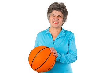 Image showing Female senior holding basketball 