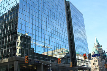 Image showing Tower crane and clear sky reflected on a building, Queen St. 