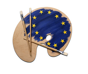 Image showing wooden artists palette loaded with european flag paints and brus