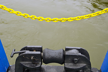 Image showing Ferry berthing mechanism yellow chain background 