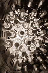 Image showing wine bottles stacked up