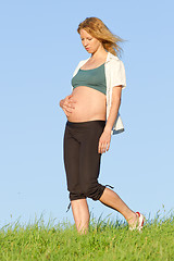 Image showing pregnant woman on meadow