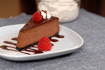 Image showing Chocolate cheesecake with raspberries