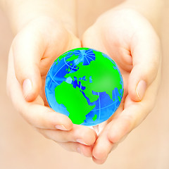 Image showing hand of the person holds globe