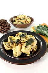 Image showing fresh rocket-ricotta tortellini with sage butter