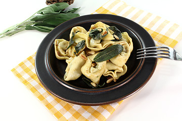 Image showing rocket-ricotta tortellini with fresh sage butter