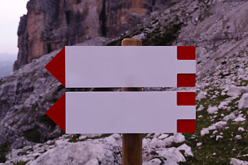 Image showing Blank direction signs in the mountains