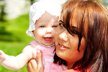 Image showing Young mother with baby