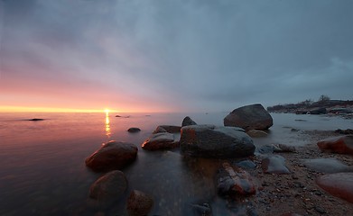 Image showing Sunset in a calm bay