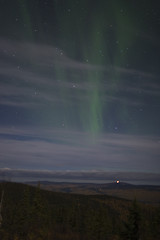 Image showing Barely visible aurora in cloudy sky