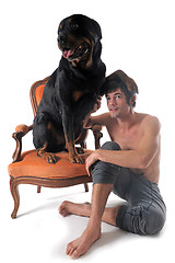 Image showing rottweiler and man