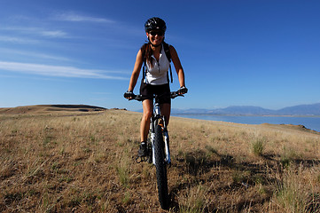 Image showing Female mountain biker