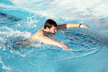 Image showing swimming butterfly in swimming pool