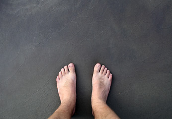 Image showing barefoot man on sea 