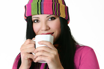 Image showing Woman drinking from mug