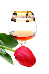 Image showing Brandy and flower on a white background. 