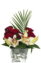 Image showing Yellow Lys and rose flowers in a vase