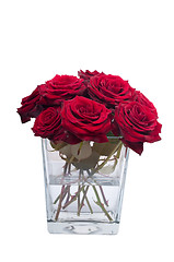 Image showing Bunch of red rose flowers in a small vase