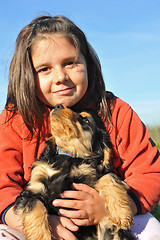 Image showing puppy english cocker and child