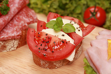 Image showing Fingerfood with tomatoes and mozzarella