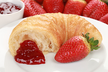 Image showing Croissant with strawberry marmalade