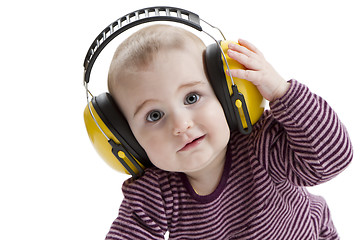 Image showing young child with ear protector