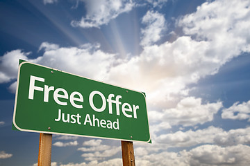 Image showing Free Offer Just Ahead Green Road Sign and Clouds