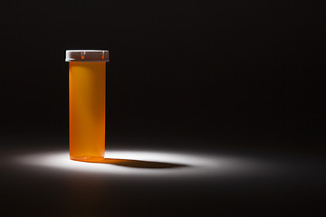 Image showing Empty Medicine Bottle Under Spot Light