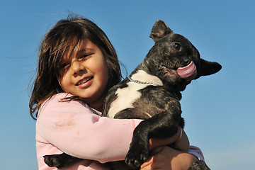 Image showing french bulldog and child